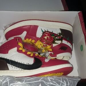 Stylish Red and White Sneakers with Rose Detail